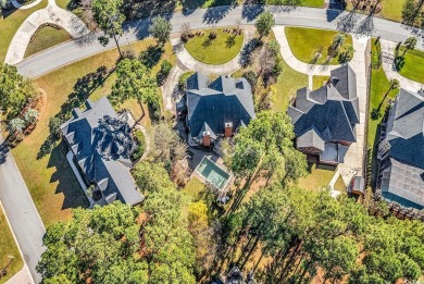 Surrounded by lush greenery and the quiet peacefulness that is on Myrtlewood Golf Course and Club  in South Carolina - for sale on GolfHomes.com, golf home, golf lot