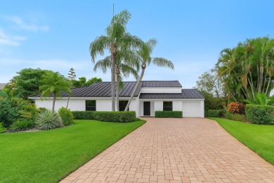 Rare 4-Bedroom CBS Home in Eastpointe with 160' of Breathtaking on Eastpointe Country Club in Florida - for sale on GolfHomes.com, golf home, golf lot