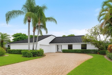 Rare 4-Bedroom CBS Home in Eastpointe with 160' of Breathtaking on Eastpointe Country Club in Florida - for sale on GolfHomes.com, golf home, golf lot