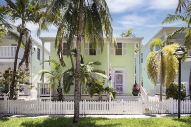 Experience the serene luxury of this exquisite multilevel spa on Key West Golf Club in Florida - for sale on GolfHomes.com, golf home, golf lot