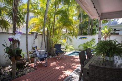 Experience the serene luxury of this exquisite multilevel spa on Key West Golf Club in Florida - for sale on GolfHomes.com, golf home, golf lot