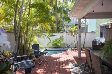 Experience the serene luxury of this exquisite multilevel spa on Key West Golf Club in Florida - for sale on GolfHomes.com, golf home, golf lot