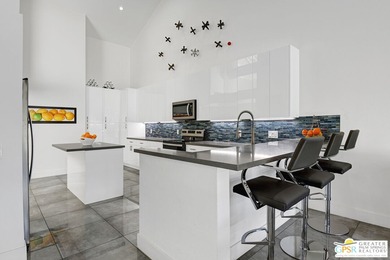 This rare San Simeon floor plan offers a thoughtfully designed on Rancho Mirage Country Club in California - for sale on GolfHomes.com, golf home, golf lot