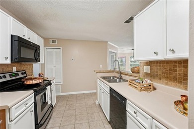 Perfectly suited for those looking to simplify without on Rivermont Golf and Country Club in Georgia - for sale on GolfHomes.com, golf home, golf lot