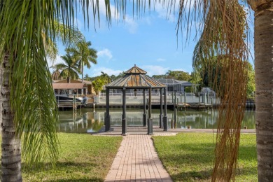 Welcome to this Beautiful WATERFRONT home located in the luxury on Rocky Point Golf Course in Florida - for sale on GolfHomes.com, golf home, golf lot