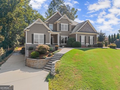Welcome home to this stunning 5-bedroom, 3.5-bathroom gem on Traditions of Braselton Golf Club in Georgia - for sale on GolfHomes.com, golf home, golf lot