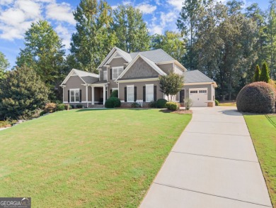 Welcome home to this stunning 5-bedroom, 3.5-bathroom gem on Traditions of Braselton Golf Club in Georgia - for sale on GolfHomes.com, golf home, golf lot