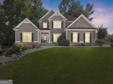 Welcome home to this stunning 5-bedroom, 3.5-bathroom gem on Traditions of Braselton Golf Club in Georgia - for sale on GolfHomes.com, golf home, golf lot