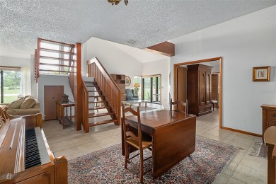 Golf Course Living at its Finest: Coveted Corner Unit in Pine on The Grand Club - Pine Lakes Course in Florida - for sale on GolfHomes.com, golf home, golf lot