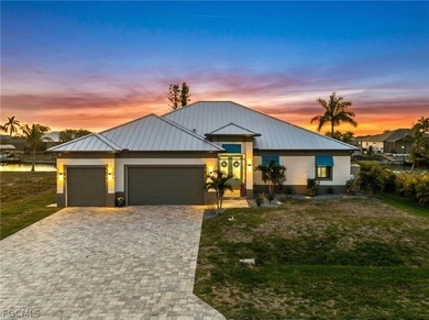 Built in 2023 along the 120-foot Optimist Canal, this on Burnt Store Golf Club in Florida - for sale on GolfHomes.com, golf home, golf lot