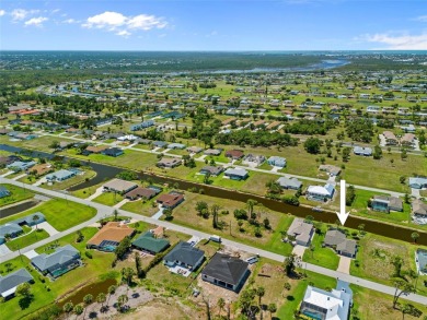 SELLER PRICED TO SELL! CANALFRONT POOL HOME LOCATED IN THE on Rotonda Golf and Country Club The Palms Course in Florida - for sale on GolfHomes.com, golf home, golf lot