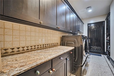 Stunning almost 8000 sq ft single-story estate in guard-gated on Rhodes Ranch Golf Club in Nevada - for sale on GolfHomes.com, golf home, golf lot