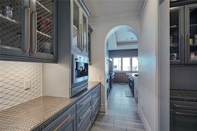 Stunning almost 8000 sq ft single-story estate in guard-gated on Rhodes Ranch Golf Club in Nevada - for sale on GolfHomes.com, golf home, golf lot