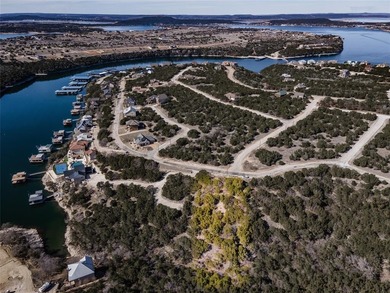 Over half an acre of golf course and water view. This sloped lot on The Cliffs Resort in Texas - for sale on GolfHomes.com, golf home, golf lot