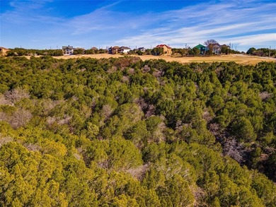 Over half an acre of golf course and water view. This sloped lot on The Cliffs Resort in Texas - for sale on GolfHomes.com, golf home, golf lot
