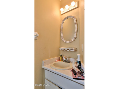 Discover effortless, maintenance-free living in the serene on The Club At Pelican Bay - North Course in Florida - for sale on GolfHomes.com, golf home, golf lot