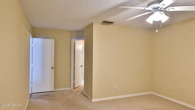 Discover effortless, maintenance-free living in the serene on The Club At Pelican Bay - North Course in Florida - for sale on GolfHomes.com, golf home, golf lot