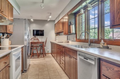 Welcome to 1305 18th Ave W--a beautifully maintained brick ranch on Spencer Golf and Country Club in Iowa - for sale on GolfHomes.com, golf home, golf lot