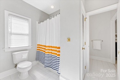 Stately Piper Glen home perfectly situated on the 3rd Green with on TPC at Piper Glen in North Carolina - for sale on GolfHomes.com, golf home, golf lot