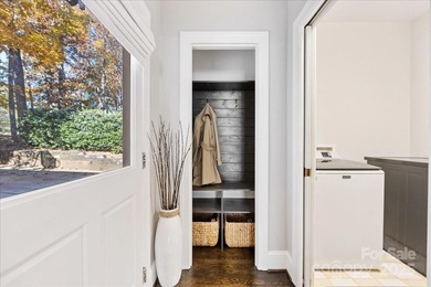 Stately Piper Glen home perfectly situated on the 3rd Green with on TPC at Piper Glen in North Carolina - for sale on GolfHomes.com, golf home, golf lot