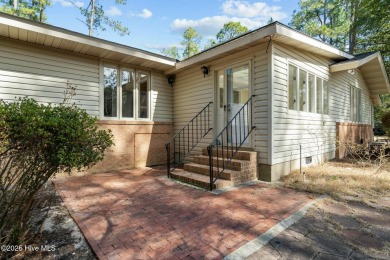 Charming home with great Golf Course views. This custom home was on Foxfire Golf and Country Club in North Carolina - for sale on GolfHomes.com, golf home, golf lot