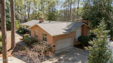 Charming home with great Golf Course views. This custom home was on Foxfire Golf and Country Club in North Carolina - for sale on GolfHomes.com, golf home, golf lot