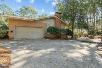 Charming home with great Golf Course views. This custom home was on Foxfire Golf and Country Club in North Carolina - for sale on GolfHomes.com, golf home, golf lot