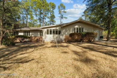 Charming home with great Golf Course views. This custom home was on Foxfire Golf and Country Club in North Carolina - for sale on GolfHomes.com, golf home, golf lot