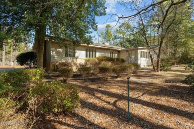 Charming home with great Golf Course views. This custom home was on Foxfire Golf and Country Club in North Carolina - for sale on GolfHomes.com, golf home, golf lot