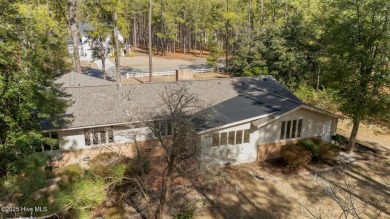 Charming home with great Golf Course views. This custom home was on Foxfire Golf and Country Club in North Carolina - for sale on GolfHomes.com, golf home, golf lot