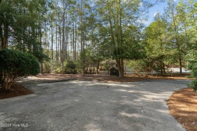 Charming home with great Golf Course views. This custom home was on Foxfire Golf and Country Club in North Carolina - for sale on GolfHomes.com, golf home, golf lot