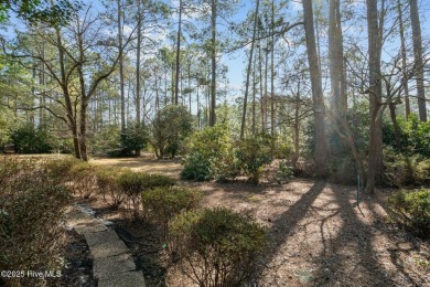 Charming home with great Golf Course views. This custom home was on Foxfire Golf and Country Club in North Carolina - for sale on GolfHomes.com, golf home, golf lot