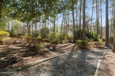 Charming home with great Golf Course views. This custom home was on Foxfire Golf and Country Club in North Carolina - for sale on GolfHomes.com, golf home, golf lot