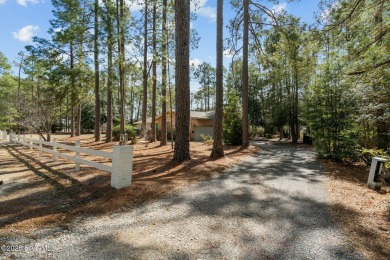 Charming home with great Golf Course views. This custom home was on Foxfire Golf and Country Club in North Carolina - for sale on GolfHomes.com, golf home, golf lot