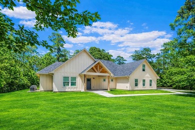 Experience true luxury in this sprawling 3.62 acre estate on Rayburn Country Club in Texas - for sale on GolfHomes.com, golf home, golf lot