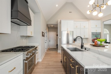 This fully renovated brick ranch with a basement offers luxury on Verdict Ridge Golf and Country Club in North Carolina - for sale on GolfHomes.com, golf home, golf lot