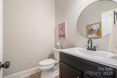 This fully renovated brick ranch with a basement offers luxury on Verdict Ridge Golf and Country Club in North Carolina - for sale on GolfHomes.com, golf home, golf lot
