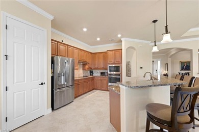 This impeccably maintained Princeton model residence is set on on Bonita National Golf Course in Florida - for sale on GolfHomes.com, golf home, golf lot