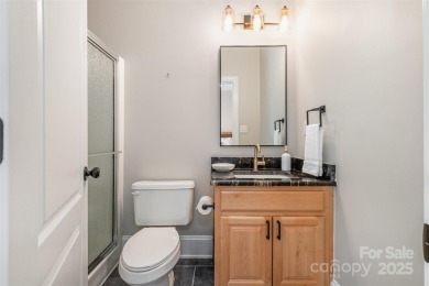 This fully renovated brick ranch with a basement offers luxury on Verdict Ridge Golf and Country Club in North Carolina - for sale on GolfHomes.com, golf home, golf lot