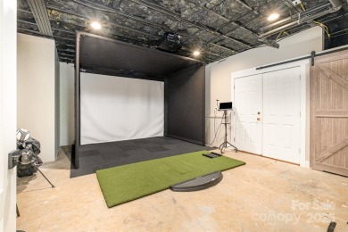 This fully renovated brick ranch with a basement offers luxury on Verdict Ridge Golf and Country Club in North Carolina - for sale on GolfHomes.com, golf home, golf lot