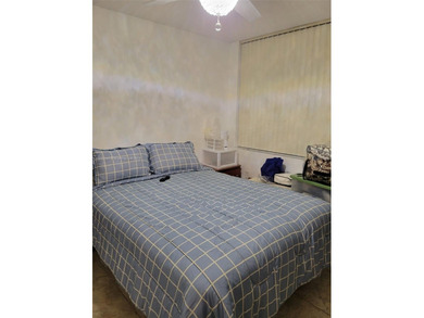 Spacious, Immaculate 2 Bedroom 2 bath condo in Gated Resort on Pembroke Lakes Golf Club in Florida - for sale on GolfHomes.com, golf home, golf lot