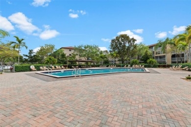 Stunning 2 bed, 2 bath fully updated condo with beautiful lake on Flamingo Lakes Country Club in Florida - for sale on GolfHomes.com, golf home, golf lot