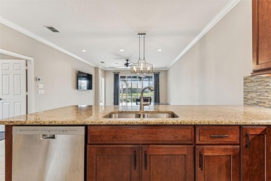 Spectacular views are yours from this 2 bdrm and den/3rd bdrm, 2 on Caloosa Greens Executive Golf Course in Florida - for sale on GolfHomes.com, golf home, golf lot