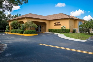 Stunning 2 bed, 2 bath fully updated condo with beautiful lake on Flamingo Lakes Country Club in Florida - for sale on GolfHomes.com, golf home, golf lot