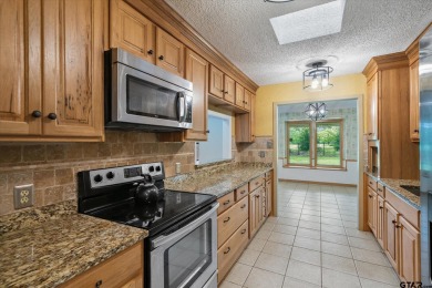 Here is your opportunity to own a big, beautiful home located on on Holly Lake Ranch Golf Club in Texas - for sale on GolfHomes.com, golf home, golf lot