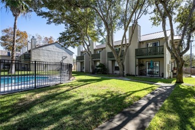 Pool views and relaxing feeling this condo in the prestigious on Rockport Country Club in Texas - for sale on GolfHomes.com, golf home, golf lot