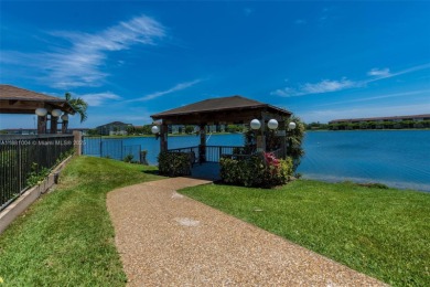 Stunning 2 bed, 2 bath fully updated condo with beautiful lake on Flamingo Lakes Country Club in Florida - for sale on GolfHomes.com, golf home, golf lot