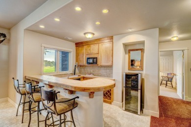 Discover luxury living in this impeccable home located in the on The Powder Horn Golf Club - Mountain in Wyoming - for sale on GolfHomes.com, golf home, golf lot