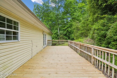 Ready for a new owner! About 5 minutes to Oak Ridge or head west on Oak Ridge Country Club in Tennessee - for sale on GolfHomes.com, golf home, golf lot