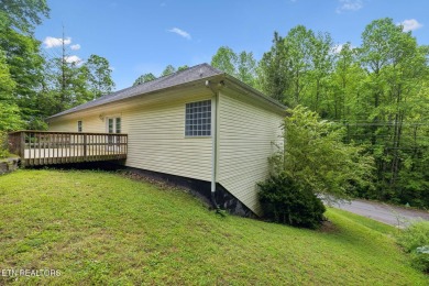 Ready for a new owner! About 5 minutes to Oak Ridge or head west on Oak Ridge Country Club in Tennessee - for sale on GolfHomes.com, golf home, golf lot
